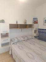 Posteľ alebo postele v izbe v ubytovaní Bahia de Vera Apartamento Monica