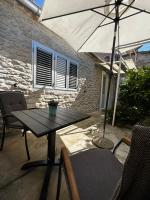 Patio alebo iná vonkajšia časť ubytovania Eleonora Apartments
