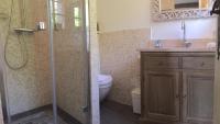 a bathroom with a shower and a toilet and a sink at Villa Saint Paul in Saint Paul de Vence