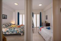 Posteľ alebo postele v izbe v ubytovaní Casa Trinacria Taormina