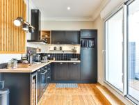 Kuchyňa alebo kuchynka v ubytovaní Chaleureux logement-centre ville-proche gare-plage
