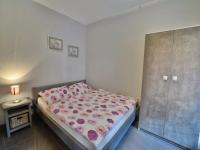 Posteľ alebo postele v izbe v ubytovaní 2-room apartment 30 m2, Rewal