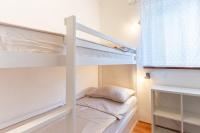 Postel nebo postele na pokoji v ubytování Apartment CRES 4249-2