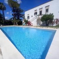 The swimming pool at or close to MASSERIA INCANTAMENTO Suite Bouganville