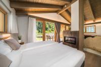 A bed or beds in a room at VILLAGGIO VAL MOLINI