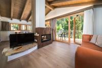 A television and/or entertainment centre at VILLAGGIO VAL MOLINI