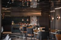 En restaurant eller et andet spisested på Wanda Yi, Beijing Qianmen - Close to Tiananmen Square