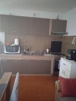 Kuchyň nebo kuchyňský kout v ubytování APARTMAN IVANO