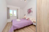 Posteľ alebo postele v izbe v ubytovaní Apartments Batela