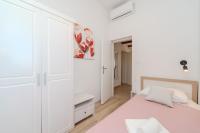 Posteľ alebo postele v izbe v ubytovaní Apartments Batela