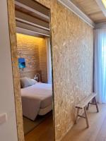 Posteľ alebo postele v izbe v ubytovaní Loft de diseño cerca del mar