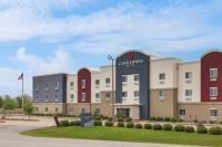 テキサスシティにあるCandlewood Suites - Texas City by IHGの建物のあるホテルのレンダリング