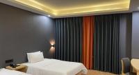 7 Days Inn Fucheng Wu Gongci Gaodeng East Street Binjiang Roadにあるベッド