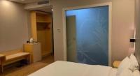7 Days Inn Fucheng Wu Gongci Gaodeng East Street Binjiang Roadにあるベッド