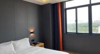 7 Days Inn Fucheng Wu Gongci Gaodeng East Street Binjiang Roadにあるベッド