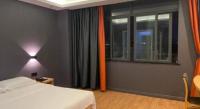 7 Days Inn Fucheng Wu Gongci Gaodeng East Street Binjiang Roadにあるベッド