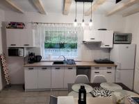Kuchyňa alebo kuchynka v ubytovaní Apartament Zacisze