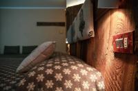Łóżko lub łóżka w pokoju w obiekcie Hotel Chaberton