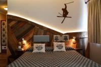 Łóżko lub łóżka w pokoju w obiekcie Hotel Chaberton