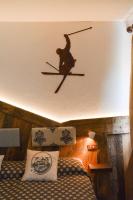 Łóżko lub łóżka w pokoju w obiekcie Hotel Chaberton