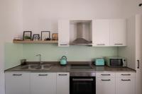 Kuchyň nebo kuchyňský kout v ubytování MV Living - Residence