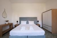 Postel nebo postele na pokoji v ubytování MV Living - Residence