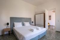 Postel nebo postele na pokoji v ubytování MV Living - Residence