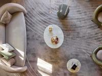 an overhead view of a stairs with a person on a table at The Playford Adelaide - MGallery in Adelaide
