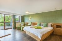 Postel nebo postele na pokoji v ubytování Dreimäderlhaus - Das vegetarische Boutique Hotel