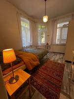 Postel nebo postele na pokoji v ubytování Taksim Apartment