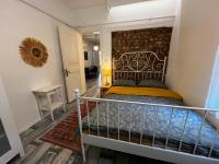 Postel nebo postele na pokoji v ubytování Taksim Apartment