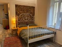 Postel nebo postele na pokoji v ubytování Taksim Apartment