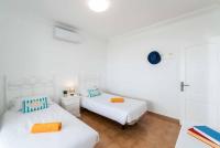 Postel nebo postele na pokoji v ubytování Villa Mero