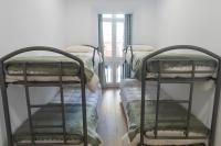 Postel nebo postele na pokoji v ubytování Apartamentos La Cruz Verde