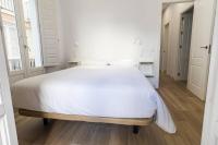 Postel nebo postele na pokoji v ubytování Apartamentos La Cruz Verde