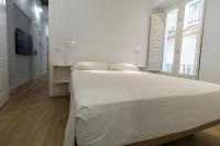 Postel nebo postele na pokoji v ubytování Apartamentos La Cruz Verde