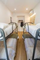 Postel nebo postele na pokoji v ubytování Apartamentos La Cruz Verde