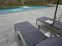 The swimming pool at or close to Weingut-Gästezimmer UHL