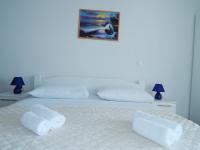 Posteľ alebo postele v izbe v ubytovaní APARTMENTS KING 2