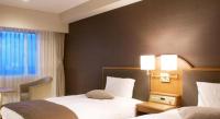 Imazu Sun Bridge Hotelにあるベッド