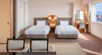 Imazu Sun Bridge Hotelにあるベッド