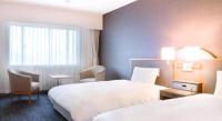 Imazu Sun Bridge Hotelにあるベッド