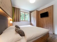 Łóżko lub łóżka w pokoju w obiekcie Luxury Chalet in Saalbach-Hinterglemm with Sauna