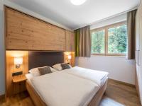 Łóżko lub łóżka w pokoju w obiekcie Luxury Chalet in Saalbach-Hinterglemm with Sauna