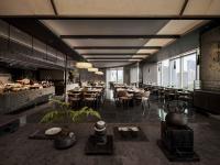 Un restaurante con mesas, sillas y ventanas. en SAVHE Hotel Binhe Times Shenzhen, en Shenzhen
