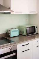 Kuchyň nebo kuchyňský kout v ubytování MV Living - Residence