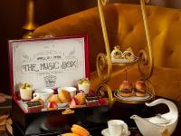 a display of desserts and pastries on a table at Hotel de l'Opera Hanoi - MGallery in Hanoi