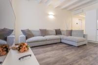A seating area at Modern & Stylish Apartment in Como City by Rent All Como