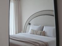 A bed or beds in a room at Atlantica Thalassa Hotel