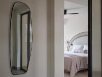 A bed or beds in a room at Atlantica Thalassa Hotel
